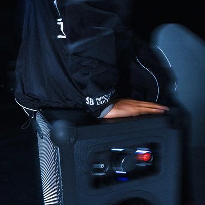 person sitting on the limited edition Spektra Soundboks 4